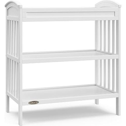 Graco Benton Changing Table with Bonus Water-Resistant Changing Pad (White) - GREENGUARD Gold Certified, Includes Diaper Change Pad with Safety Strap, 2 Open Storage Shelves for Organizing