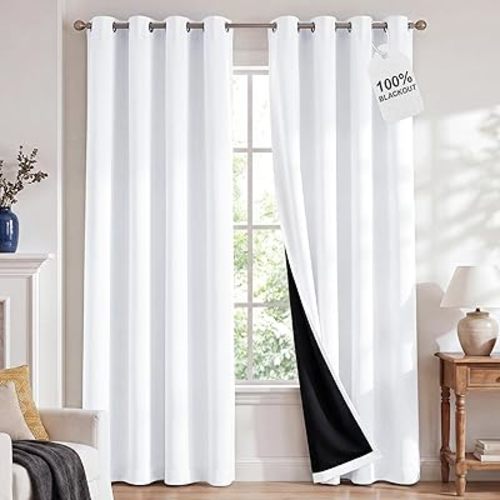 NICETOWN 100% Blackout Window Curtain Panels, Cold and Full Light Blocking Drapes with Black Liner for Nursery, 84 inches Drop Thermal Insulated Draperies (White, 2 Pieces, 52 Wide Each Panel)
