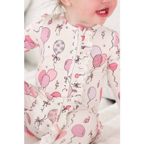 Party Time Ruffle Zipper Footie in Pink | Caden Lane