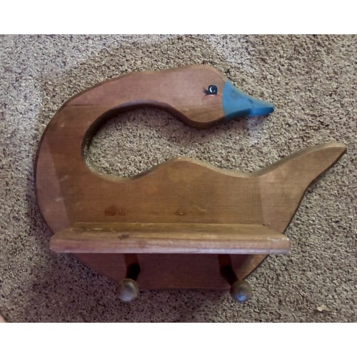 vintage handmade  wooden goose wall shelf with hooks featuring a carved duck