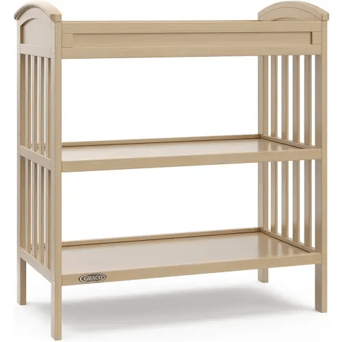 Graco Benton Changing Table with Bonus Water-Resistant Changing Pad (Driftwood) - GREENGUARD Gold Certified, Includes Diaper Change Pad with Safety Strap, 2 Open Storage Shelves for Organizing