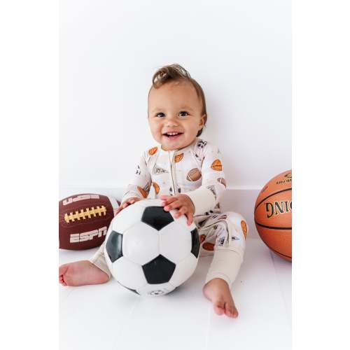 Sport themed footie pajamas