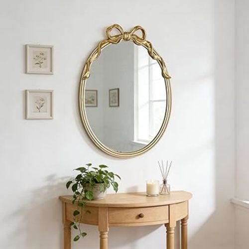 Oval Wall Mirror with Gold Finish, Iron Frame with Decorative Bow Design, Elegant Vintage Style