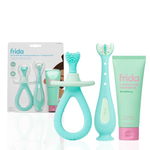 Frida Grow-with-Me Training Toothbrush + Toothpaste Set, 6+ Months | 2-Stage Training Toothbrush Set, Fluoride-Free Strawberry Toothpaste, Soft + Gentle Bristles, Easy-Grip Handles, 6+ Months
