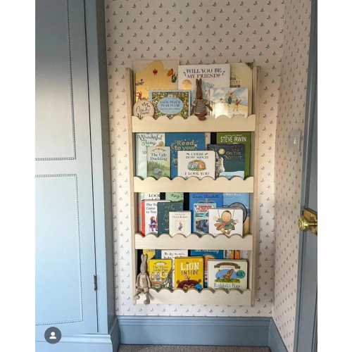 Scalloped wall mounted Montessori book shelf