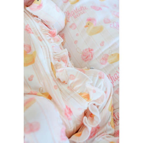 Ruffle Zipper Footie in Bubble Duckies Pink | Caden Lane