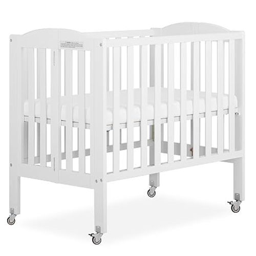 Dream On Me 2-in-1 Folding Portable Compact Mini Baby Crib in White, GreenGuard Gold & BSA, US Patented Flat Folding System, Locking Wheels,1″ Mattress Pad, Space-Saving Quck Fold Easy Storage