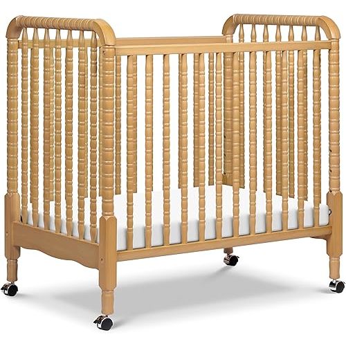 DaVinci Jenny Lind 3-in-1 Convertible Mini Crib in Honey, Removable Wheels, Greenguard Gold Certified