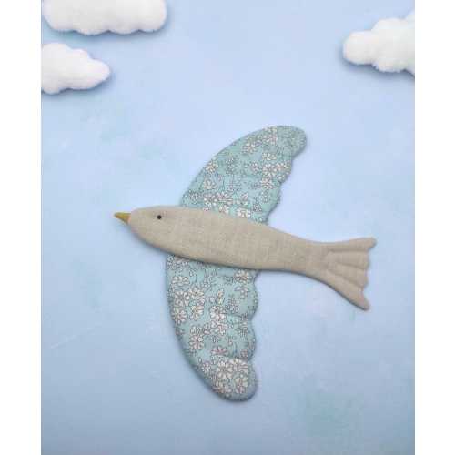 Decorative hanging bird in sky blue Liberty fabric and linen fabric