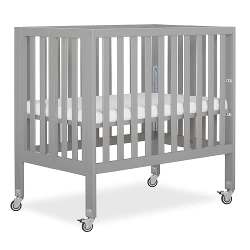 Dream On Me Jett Mini Folding Baby Crib in Pebble Grey, GreenGuard Gold & BSA, Lightweight & Portable, Patented Flat Folding System, Small Spaces & Travel, 1.5” Mattress Pad, 3 Heights, Safe Wheels