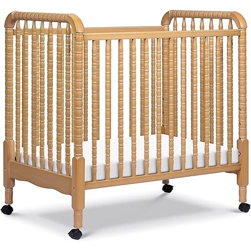 Davinci Jenny Lind 3-in-1 Convertible Mini Crib in Honey, Removable Wheels, Greenguard Gold Certified