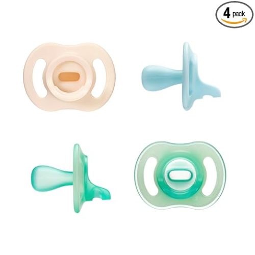 Tommee Tippee Stay Put Pacifier Set, Contains 2 Ultra-Light StayPut Glow in the Dark Pacifiers and 2 Ultra-Light StayPut Pacifiers, 0-6 Months, Colors May Vary, One-Piece Silicone Design, Pack of 4