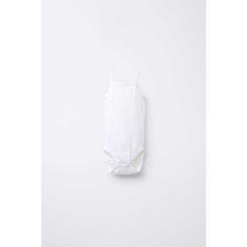 THREE-PACK OF RIBBED STRAP BODYSUITS - Oyster-white | ZARA United States
