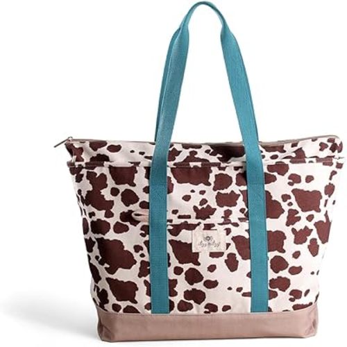 Itzy Ritzy Canvas Tote Bag - Zip-Top Closure, Roomy Main Compartment & 4 Pockets - Lightweight Cotton Canvas Carryall for Moms - Perfect for Travel, Beach, Errands & Everyday (Cow Print)
