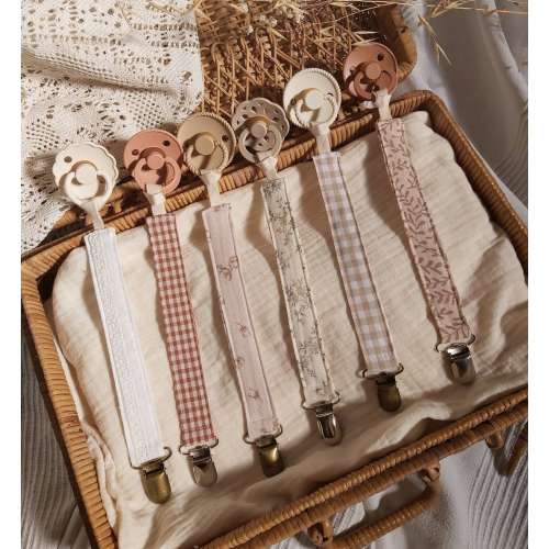 Beige pacifier clip