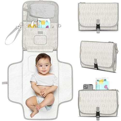 KeaBabies Portable Diaper Changing Pad - Large Waterproof Baby Changing Mat, Compact Travel Diaper Clutch, Functional Pockets Fit Newborn Essentials, Wipeable & Padded Baby Changer (Prism)