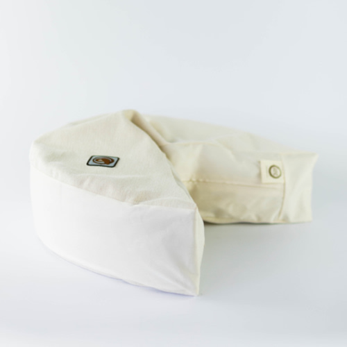 organic nesting pillow in vanilla bean