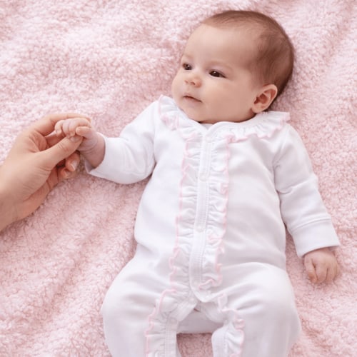 Baby Girl White Footie with Pink Ruffle - Magnolia Baby Pima Cotton