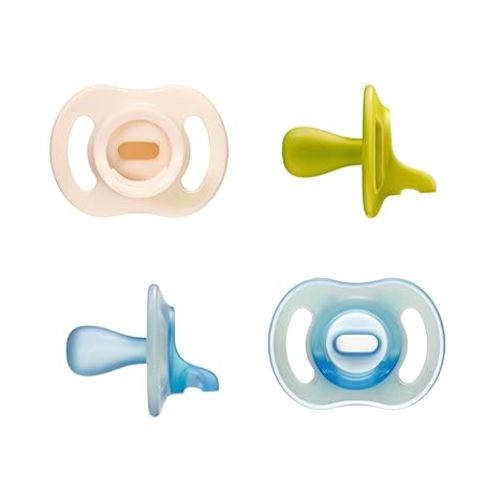 Tommee Tippee Stay Put Pacifier Set, Contains 2 Ultra-Light StayPut Glow in The Dark Pacifiers and 2 Ultra-Light StayPut Pacifiers, 0-6 Months, Colors May Vary, One-Piece Silicone Design, Pack of 4