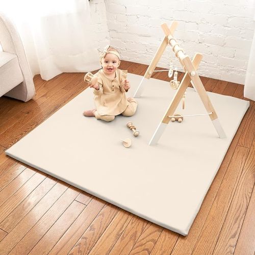 Stylish Padded Baby Play Mat for Your Boy or Girl - Extra Thick & Super Soft Vegan Leather Floor Mat Creates A Safe Play Area for Little Ones - A Beautiful Playmat That Fits Nicely Into Any Playroom - Beige