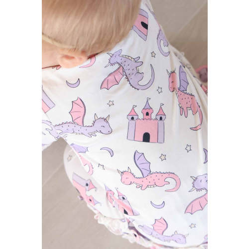 Dragon Adventure Ruffle Zipper Footie in Pink | Caden Lane