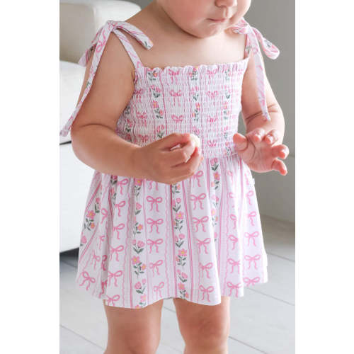 Smocked Twirl Bodysuit in Coquette Garden | Caden Lane
