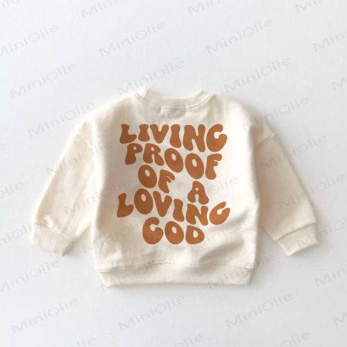 LIVING PROOF OF A LOVING GOD Baby Toddler Cream Sweatshirt