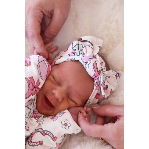 Rodeo Dreams Knit Large Bow Headwrap in Pink | Caden Lane