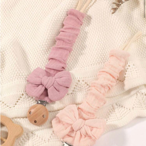 2pcs Baby Solid & Printed Pacifier Clips, Bowknot Pacifier Holder, Wooden 3-Hole Pacifier Clips, Suitable For Daily Use In Blue, Pink, Khaki | SHEIN USA