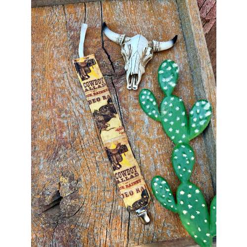 Cowboy baby pacifier clip