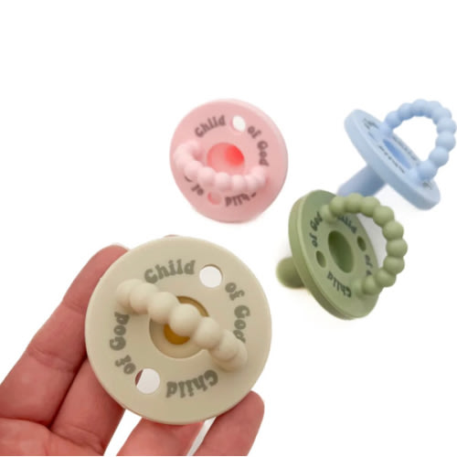 OUR HOUSE ABOVE - Child of God Pacifier in color Pink