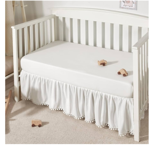 TILLYOU Baby Crib Skirt Girls Boys, Ruffled Bed Skirt with Pompoms, 28”x 52”, 14'' Drop, White