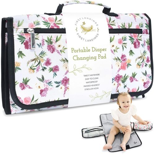 Portable Diaper Changing Pad by First Landings | Convenient, On The Go Baby Change Mat with Head Cushion | Changing Station with Pockets for Diapers and Wipes | Travel Changing Mat for Diaper Bag