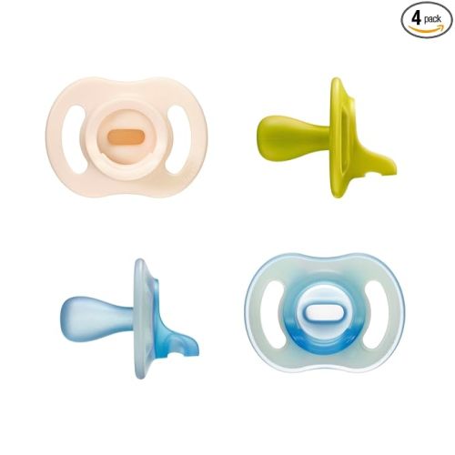 Tommee Tippee StayPut Pacifier Set, 6-18 Months, Silicone, Pack of 4 | 2 Glow in the Dark + 2 Ultra-Light StayPut Pacifiers, One-Piece Design, Colors May Vary, BPA Free
