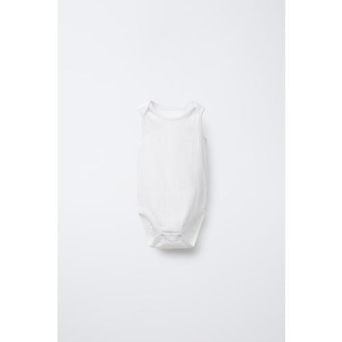 THREE-PACK OF RIBBED SLEEVELESS BODYSUITS - Oyster-white | ZARA United States