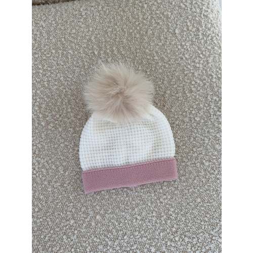 Beautiful knitted Merino Wool Hat with pompom.