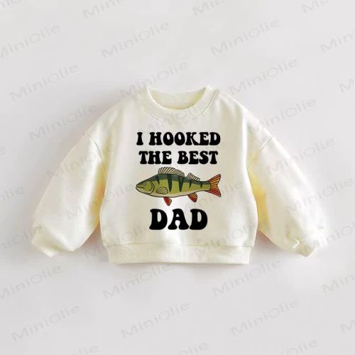 I HOOKED THE BEST DAD Baby Toddler Cream Sweatshirt
