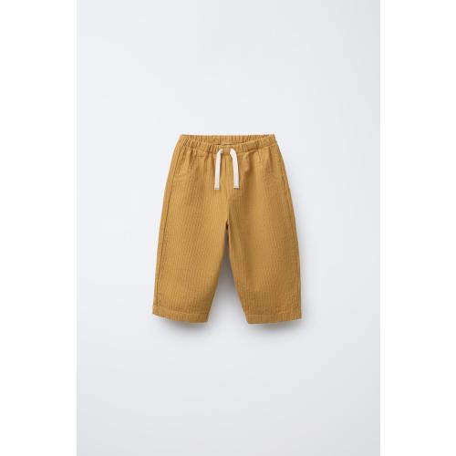 TEXTURED BAGGY PANTS - Ocher | 12-18M
