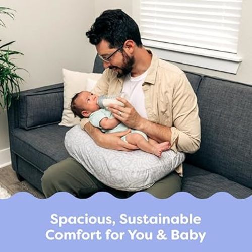 Boppy Nursing Pillow - Firm, Ergonomic U-Shaped Bottle and Breastfeeding Pillow with High Lift for Comfort and Support, Spacious Surface - Cream Retro Squiggles