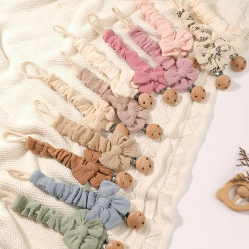 2pcs Baby Solid & Printed Pacifier Clips, Bowknot Pacifier Holder, Wooden 3-Hole Pacifier Clips, Suitable For Daily Use In Blue, Pink, Khaki | SHEIN USA