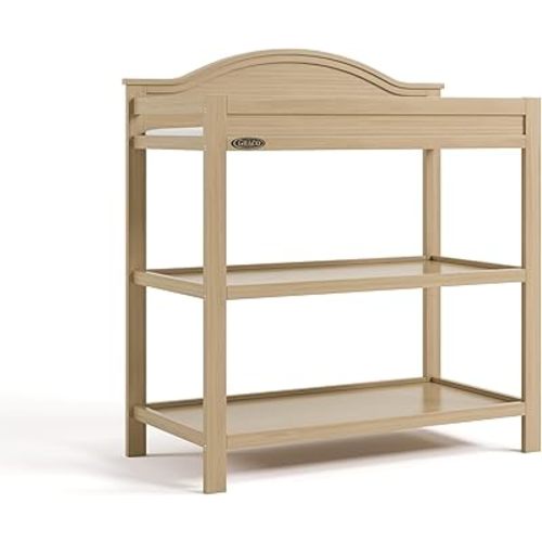 Graco Story Changing Table with Water-Resistant Pad – GREENGUARD Gold Certified Baby Changing Station with Safety Strap, 2 Open Shelves, and a Nursery Must-Have Design (Driftwood)