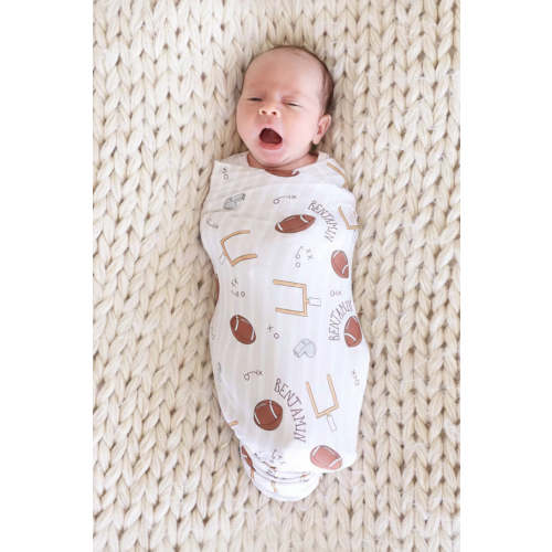 Tiny Touchdowns Personalized Swaddle Blanket in Neutral | Caden Lane