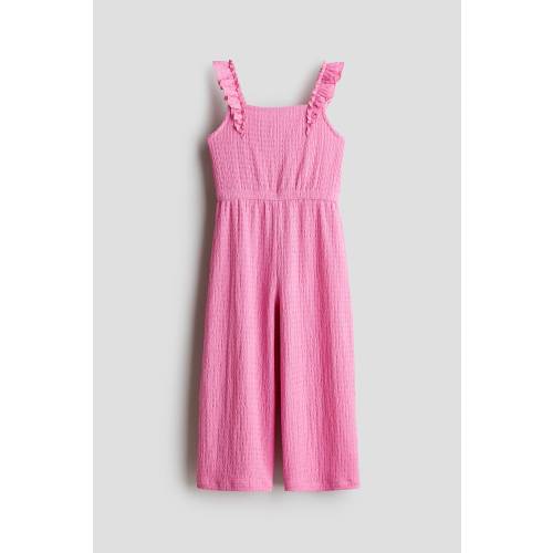 RUFFLE-TRIMMED JUMPSUIT