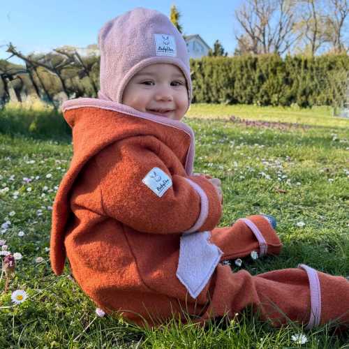 Walkoverall growing with , wool overall with turn-up sleeves and feet, overall made of 100% virgin wool