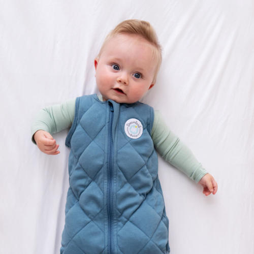 Dreamland Baby | Weighted Sleep Sacks & Swaddles