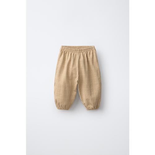 TEXTURED STRIPED PANTS