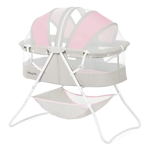 Dream On Me Karley Baby Bassinet in Grey and Pink, Lightweight Portable, Quick Fold and Easy to Carry , Adjustable Double Canopy, Indoor and Outdoor with Large Storage Basket.