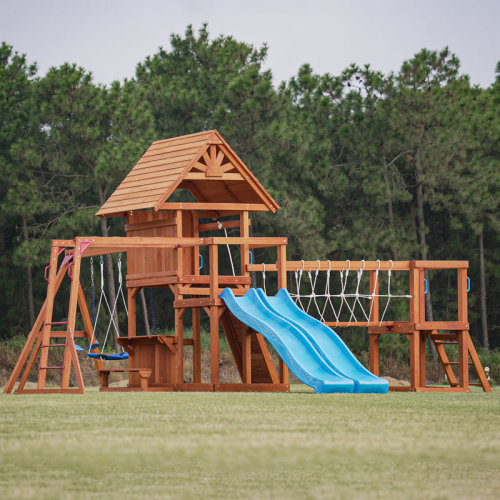 Dolphin Playground Luxury Cedar Playground Set: Double Wave Slide, 2-in-1 Table, Monkey Bars, Balance Beam, 3 Swings, Large Rock Wall, Wood Roof & Reviews | Wayfair