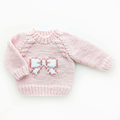 Huggalugs Blush Pink Hand‑Knit Girls’ Sweater with Bow Detail