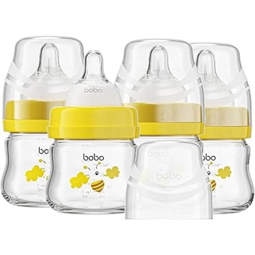 YOHKOH Glass Baby Bottles with Slow Flow Nipple, Newborn Anti-Colic Baby Bottles for 0+ Months, Wide Neck Feeding Bottle, Clear (Yellow, 2.7oz (Pack of 4))